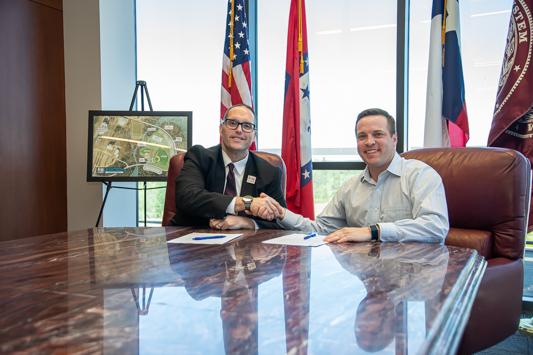 Photo: Texas A&M University-Texarkana President Dr. Ross Alexander (left) and State Bank President Brock McCorkle (right) shake hands after signing a memorandum of understanding between the bank and the university. Eligible bank employees will receive discounted tuition at Texas A&M University-Texarkana.