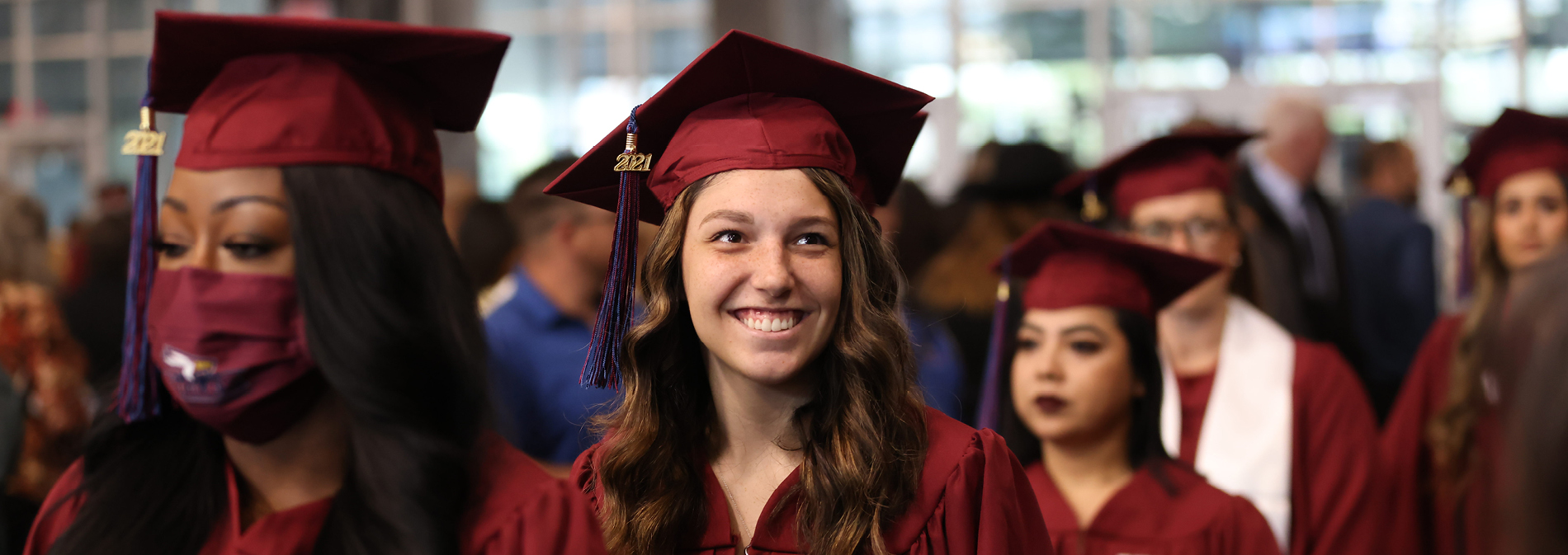 Photo of girl smiling at graduation.