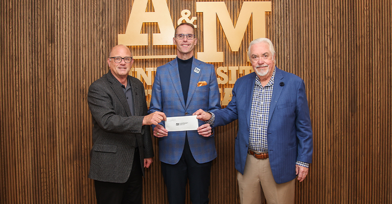 Council on Regional Health Education Board President Bob Bruggeman (left) and Board member The Honorable Ted Capeheart (right) present a donation to Texas A&M University-Texarkana President Dr. Ross Alexander (center). The donation will create an endowed nursing scholarship at the University.